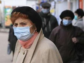 Неужели снова придется ходить в масках? Фото korrespondent.net